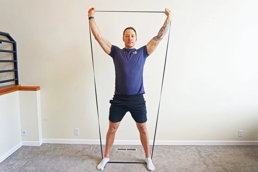 Man doing Resistance Band Overhead Press